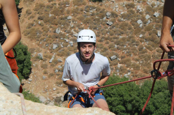A camper climbing.